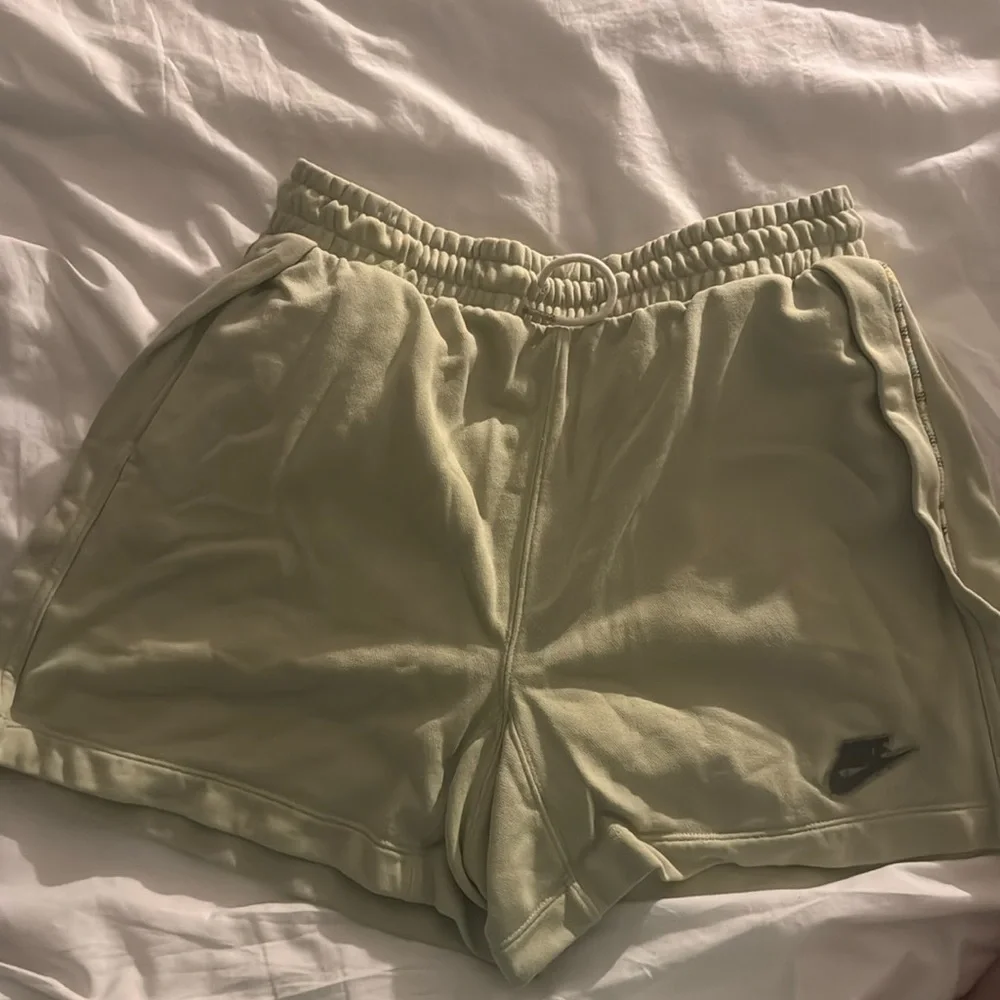 Green Nike sweat shorts